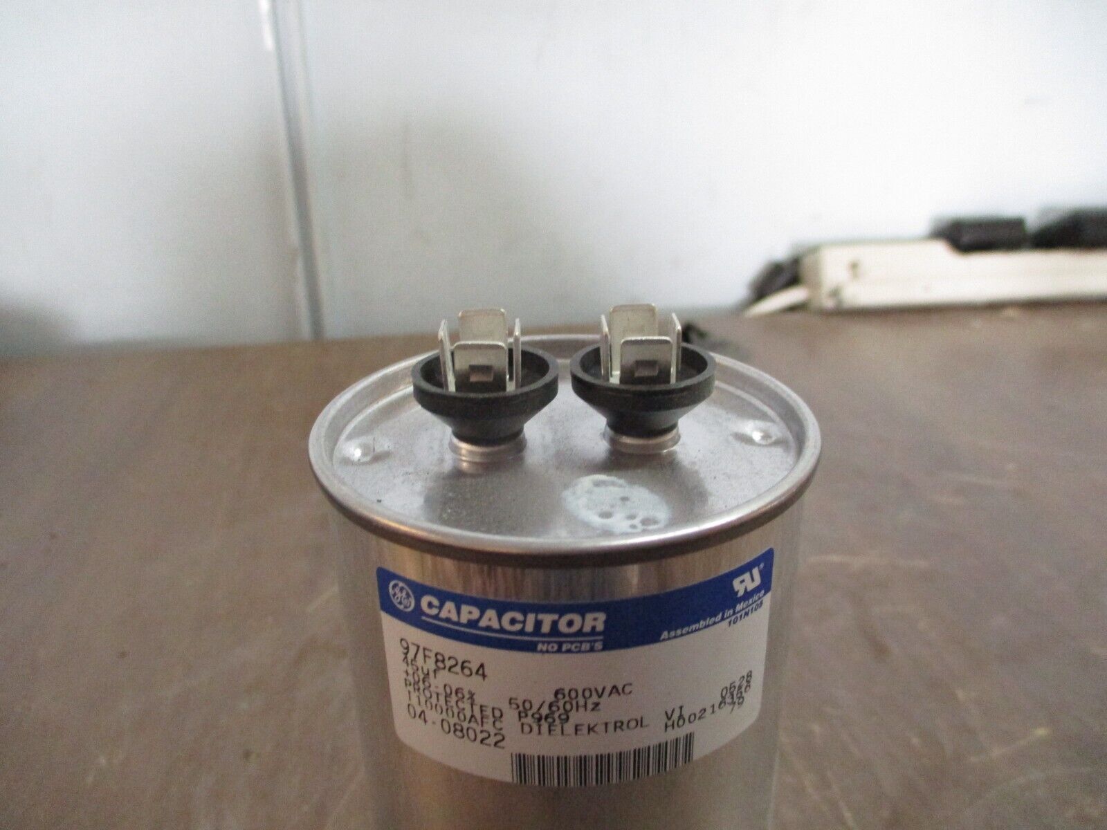 GE Capacitor 97F8264 45uF 600V 50/60Hz Used